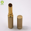 empty cosmetic container gold metal lip gloss lipstick tube